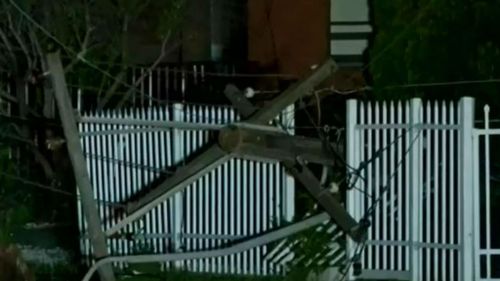 Nearby homes were left without electricity when a power pole was brought down. (9NEWS)