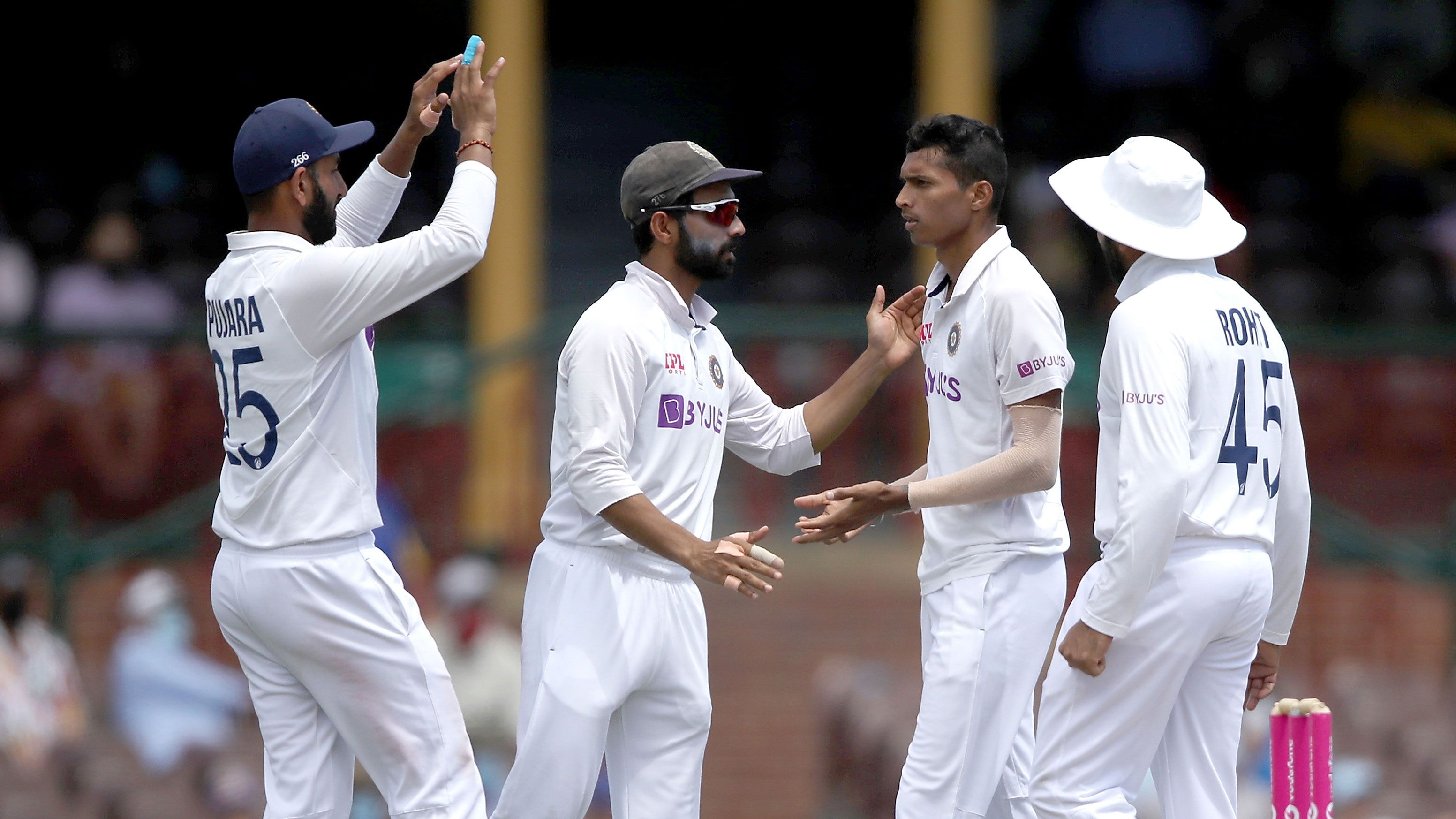 India players celebrate a wicket during the SCG Test.