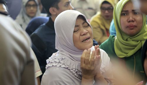 Stricken relatives are arriving at Indonesia's National Search and Rescue Agency headquarters in Jakarta for word of their loved ones on the Lion Air plane.