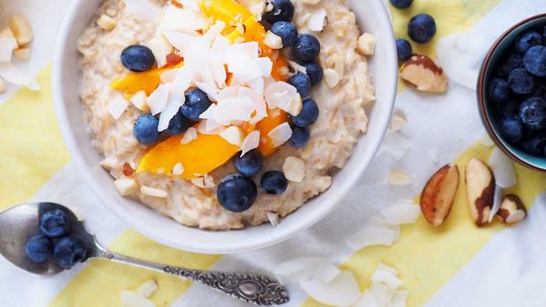 Coconut rice porridge with summer fruits