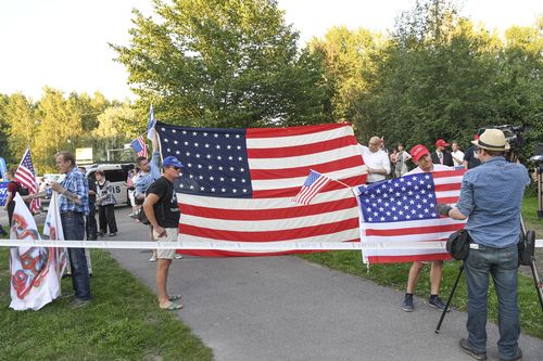 A group of pro-Trump protesters have descended on the president's hotel in Helsinki. Picture: AAP