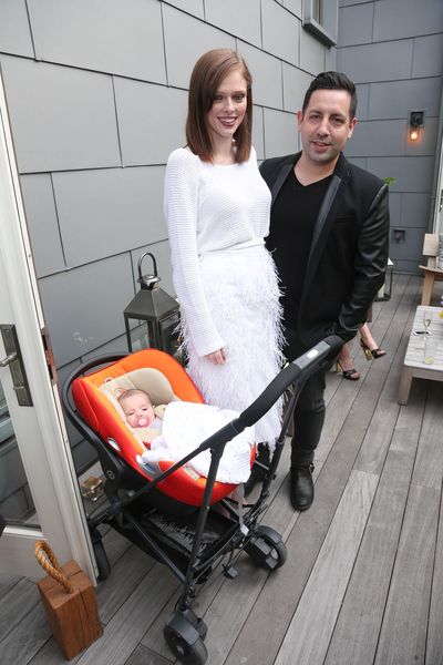 <p>Model child: Coco Rocha, in New York with husband James Conran, and their newborn daughter tucked into a classic Cybex.</p>