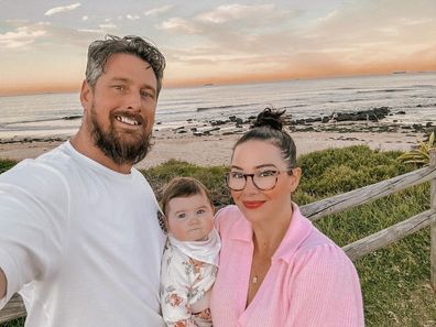 Jade Redmond and husband Craig with their second child, River.