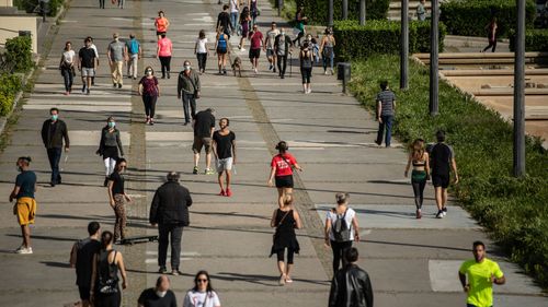 People exercise on May 02, 2020 in Barcelona, Spain