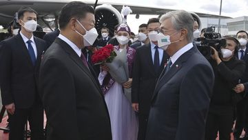 Kazakhstan  President Kassym-Jomart Tokayev, right, meets Chinese President Xi Jinping in an airport in Nur-Sultan, Kazakhstan, 