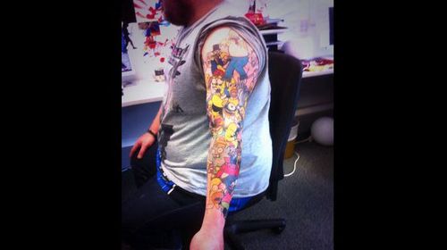 Mr Weir has a total 41 tattoos of Homer Simpson on his left arm. (Twitter)