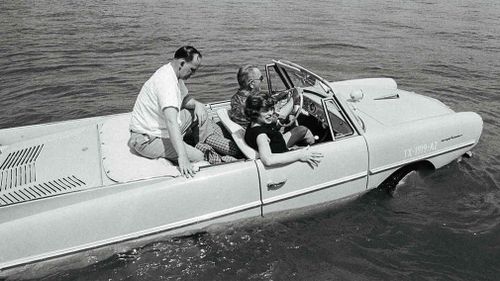 LBJ takes his Amphicar for a dip. 