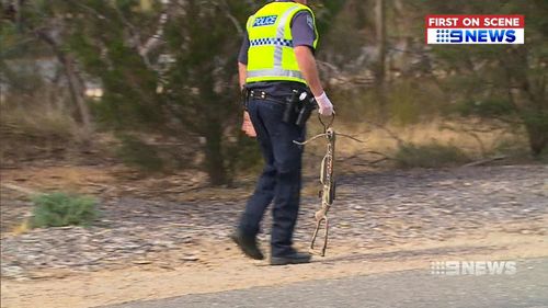 The second man, a 38-year-old was charged over the discovery of a large crossbow found in the boot of his car. (9NEWS)