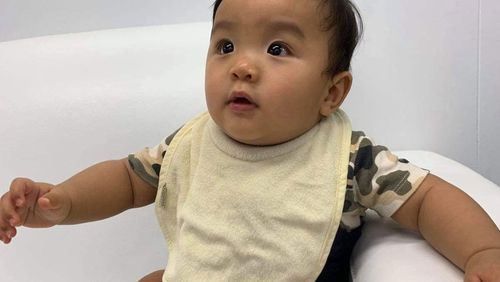 Baby boy Hoang Vinh Le, pictured, was last seen at a medical centre.