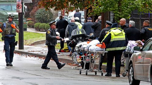 Three officers were also shot in the attack at the Tree of Life Congregation in Pittsburgh's Squirrel Hill neighborhood.