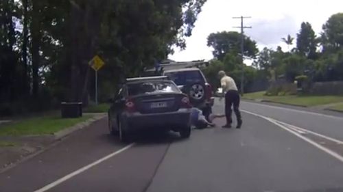 The man in the shorts was felled by the first punch, but did get up. (Dash Cam Owners Australia)