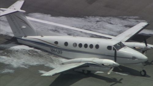 The plane circled for an hour before sliding down the tarmac at Perth Airport.