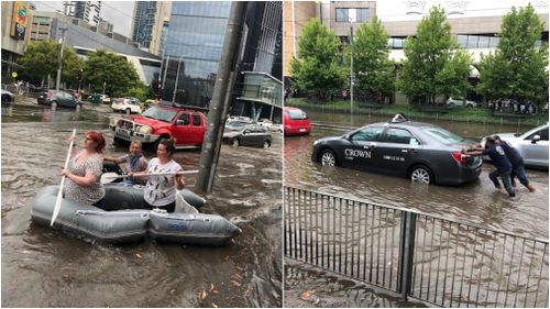 Some women took an inflatable raft for a paddle in the CBD, while a pair of men helped stranded cab driver.