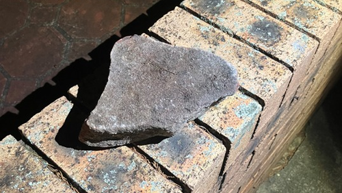 A rock that hit a car.