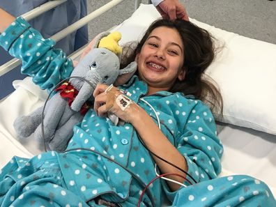 Imogen Clements in hospital after the tumour was discovered.