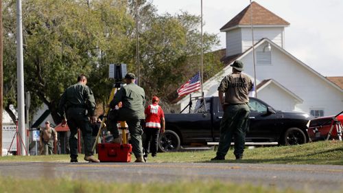 Investigators attend the scene. (AAP)