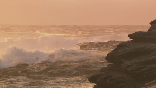 Waves at some beaches are forecast to reach five metres in height.