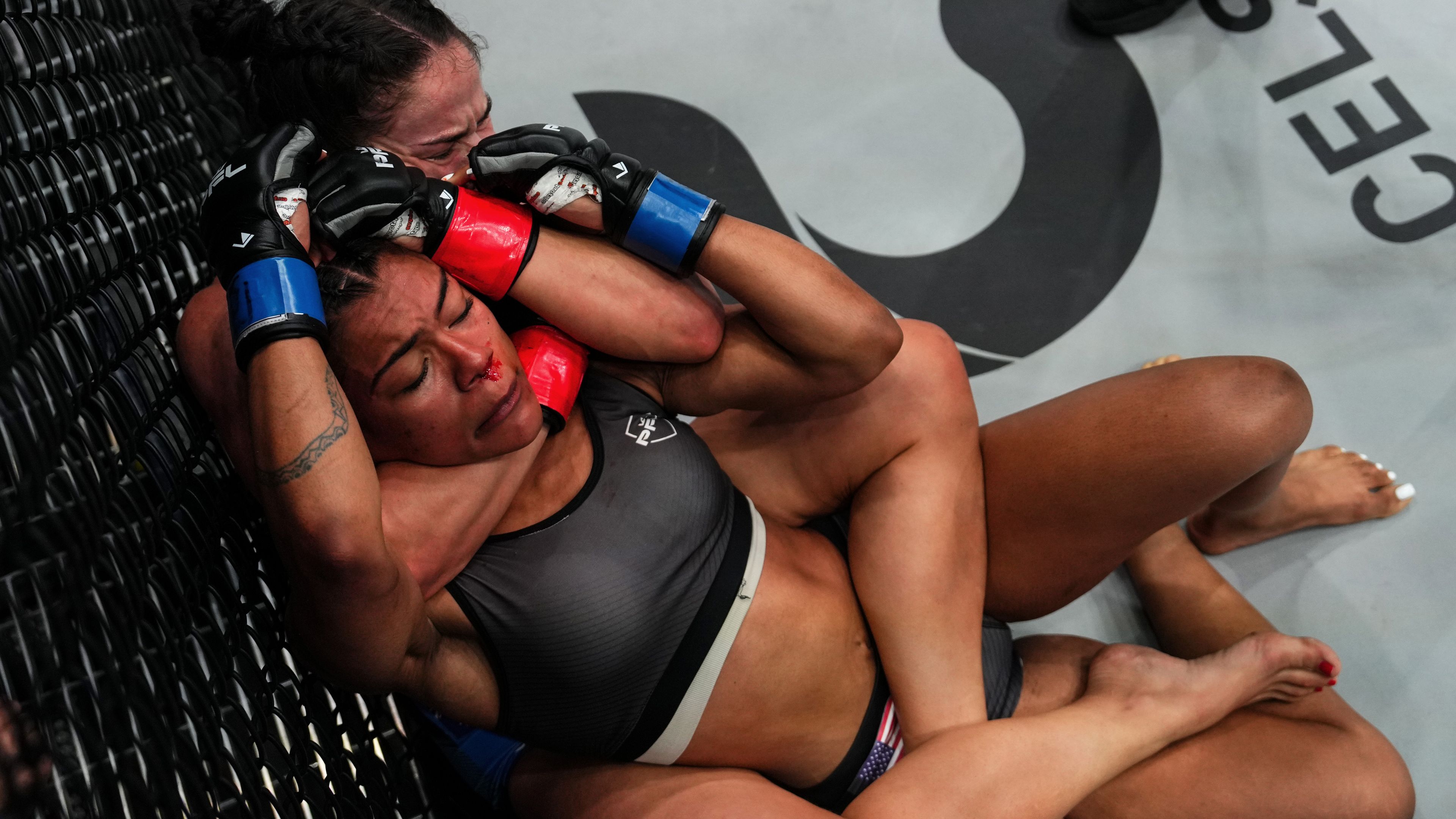 Chelsea Hackett works for a submission against Ky Bennett in her PFL Playoffs debut.