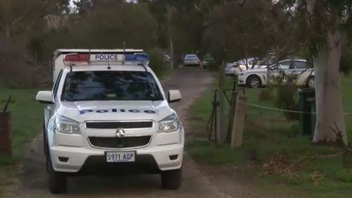 The bodies of three people were found inside the home. (9NEWS)