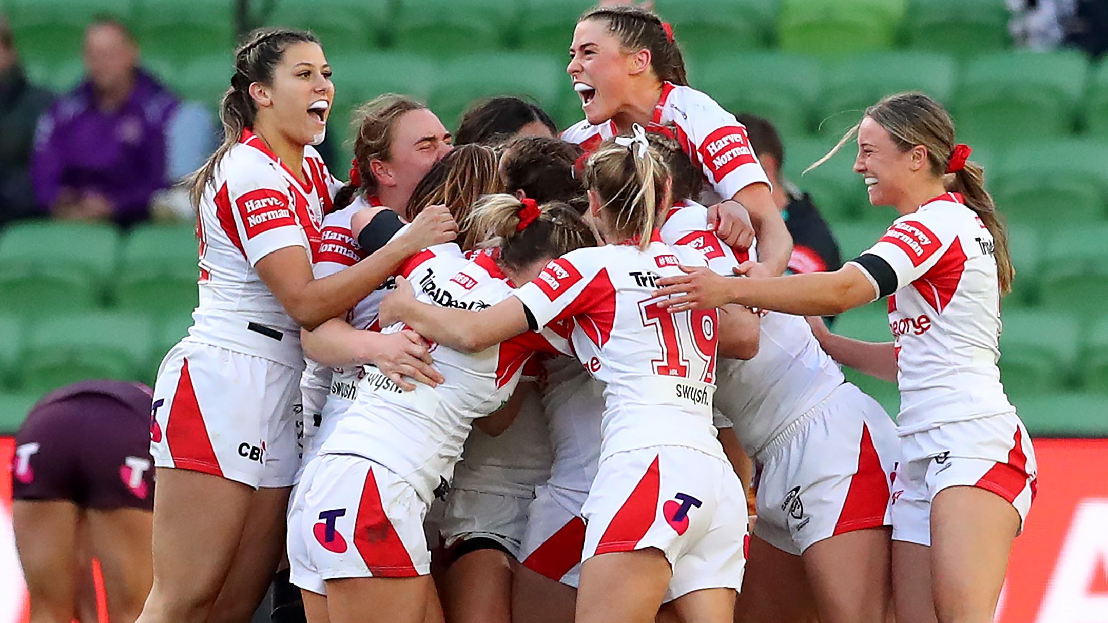 Dragons players celebrate victory during the round four NRLW match between Brisbane Broncos and St George Illawarra Dragons at AAMI Park.