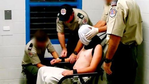This image of Voller in a spit-hood and strapped to a restraint chair prompted the Prime Minister to order a Royal Commission into the Protection and Detention of Children in the Northern Territory. 