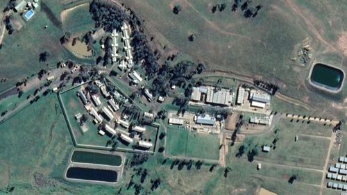 A prison guard has been charged over an alleged intimate relationship with an inmate at St Heliers Correctional Facility.