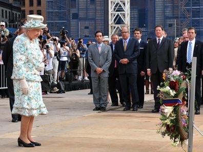 Queen Elizabeth II lays a wreath at the site of the World Trade Centre, in New York City, for the victims of 9/11 in 2010. (Photo by John Stillwell/PA Images via Getty Images)