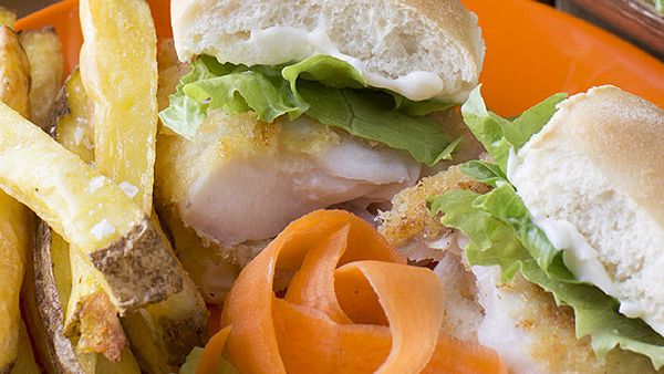 Yummy barramundi burgers with oven fries, salad and mayo