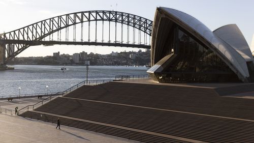 A near empty Sydney Opera House forecourt.