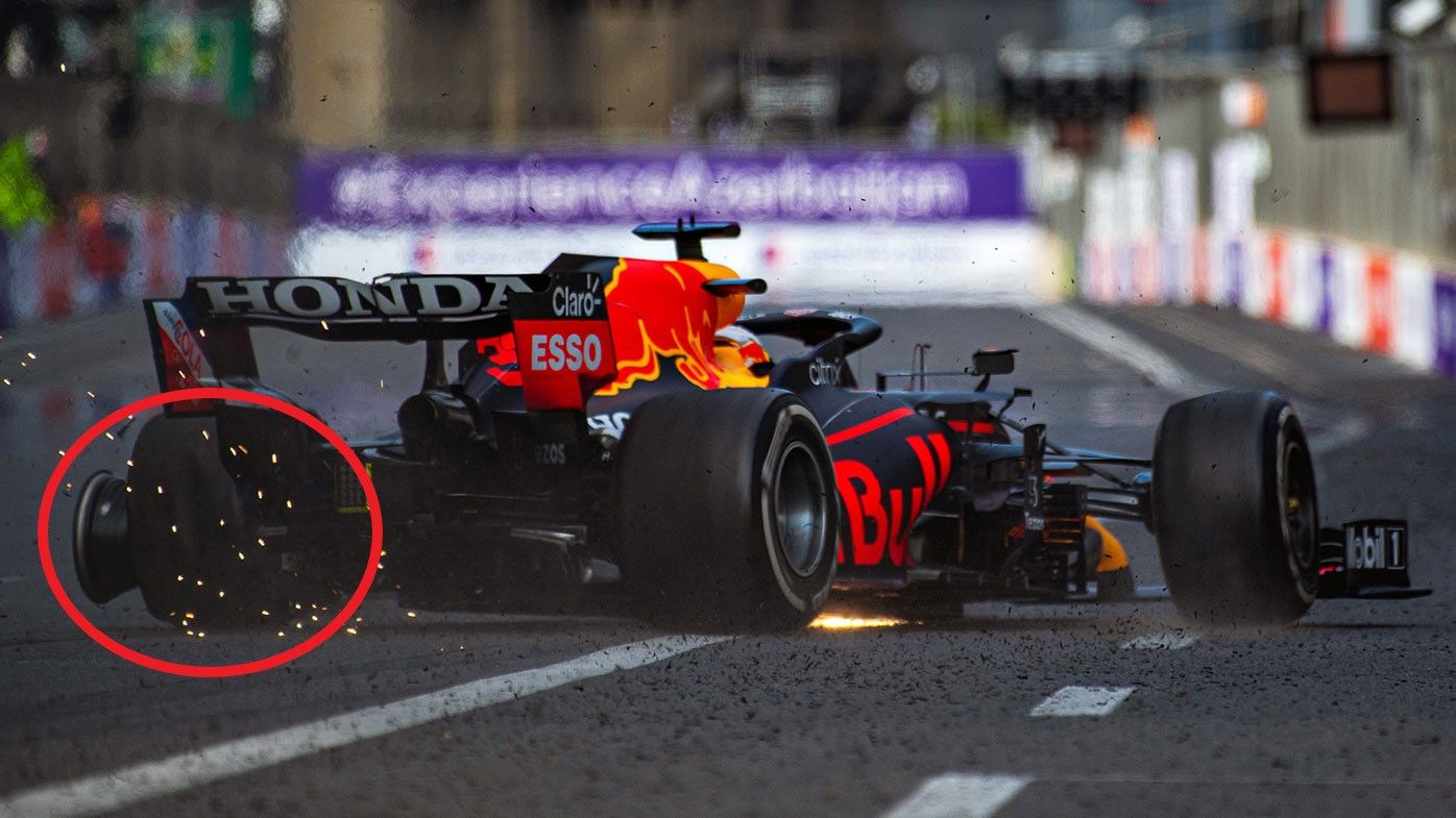 Max Verstappen is sent towards the wall as his left-rear tyre fails.