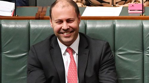 Josh Frydenberg has attacked Bill Shorten over his opposition to the Adani coal mine (Image: AAP)
