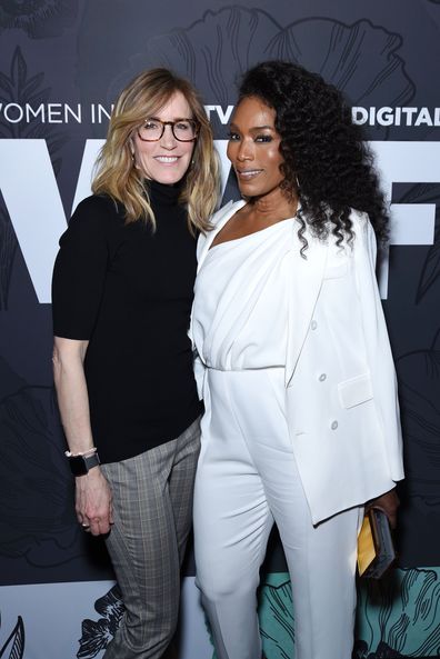 Felicity Huffman and Angela Bassett attend the Annual Women in Film Oscar Nominees Party in February.