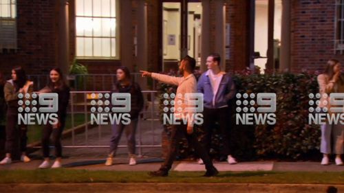 Dozens of people were seen queueing to get in to Greengate Hotel in Killara on the city's north shore last night, social distancing only when security guards spotted 9News cameras.