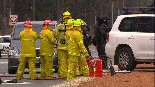 Anzac Parade has been cordoned off as crews attend the scene. (9NEWS)