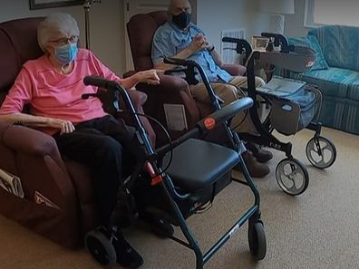 Glenna and Eugene Luetgers sit in their unit at Cherrywood Pointe of Plymouth.