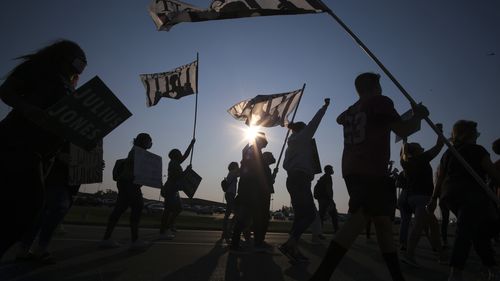 Demonstrators march in support of Julius Jones during the commutation hearing in Oklahoma City on Monday, September 13, 2021. 