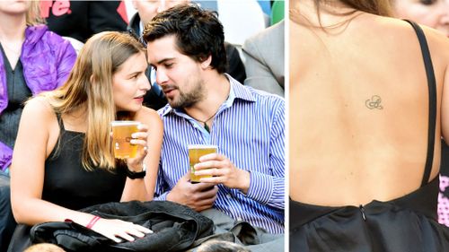 Frances Abbott with boyfriend Lindsay Smith at the Australian Open and (right) her back tattoo. (AAP)