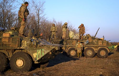 Ukrainian soldiers take a position near Urzuf, south coast of Azov sea, eastern Ukraine.