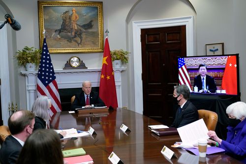 President Joe Biden meets virtually with Chinese President Xi Jinping