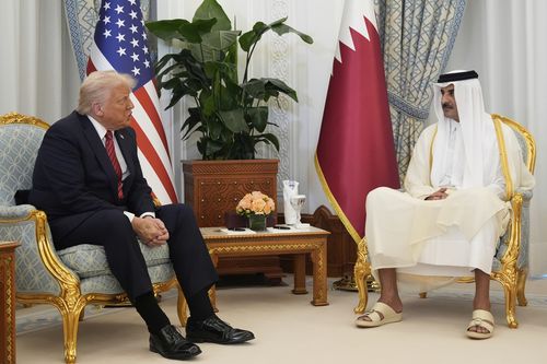 President Donald Trump and Qatar's Emir Sheikh Tamim bin Hamad Al Thani