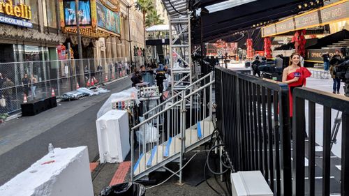 Members of the media access the event from this rear area. (9NEWS/Ehsan Knopf)