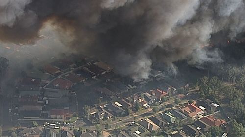 The fire began in Glenfield before spreading in Casula and Wattle Grove. (9NEWS)