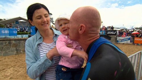 Trent with his family after the swim.