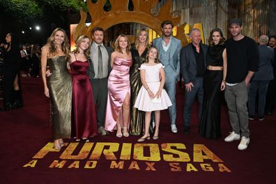 LONDON, ENGLAND - MAY 17: Samantha Hemsworth (L), Luke Hemsworth (third left), Chris Hemsworth (fourth right), Gabriella Brooks (second right), Liam Hemsworth (R) and guests attend the UK premiere of "Furiosa: A Mad Max Saga" at the BFI IMAX Waterloo on May 17, 2024 in London, England.  (Photo by Kate Green/Getty Images for Warner Bros. Pictures)
