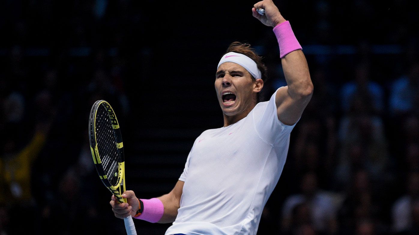 Rafael Nadal celebrates beating Tsitsipas