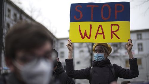 People protest against the tension between Russia and Ukraine in Berlin as Australian PM Scott Morrison urges China to join in imposing sanctions.