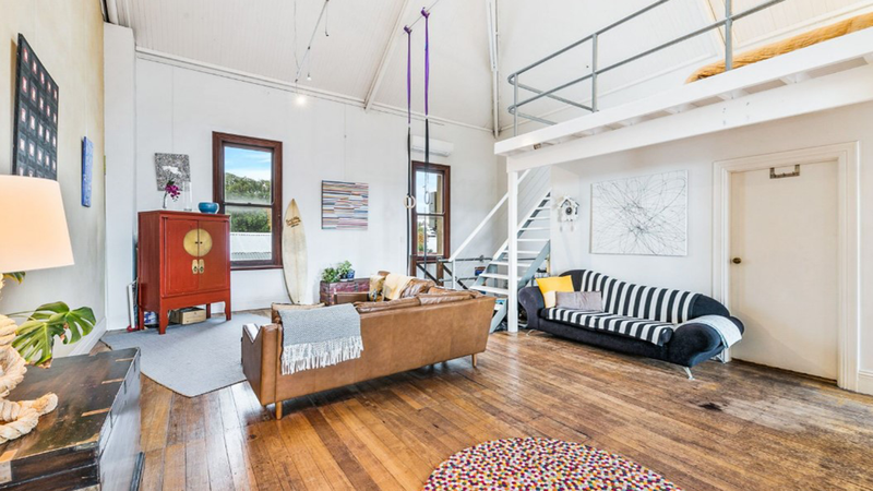 Gymnastic rings in the living room of quirky apartment for sale in Western Australia