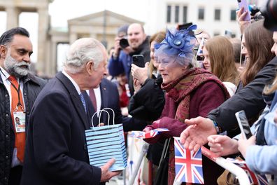 King Charles III meets members of the public during the Ceremonial welcome at Brandenburg Gate on March 29, 2023 in Berlin, Germany.  