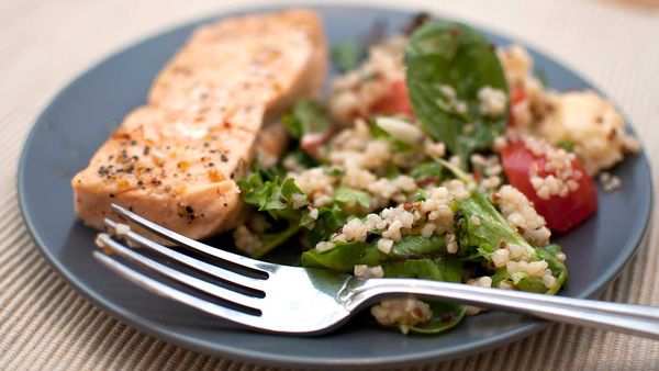 Salmon with spinach and red quinoa salad recipe, as featured in Shape Me by Susie Burrell