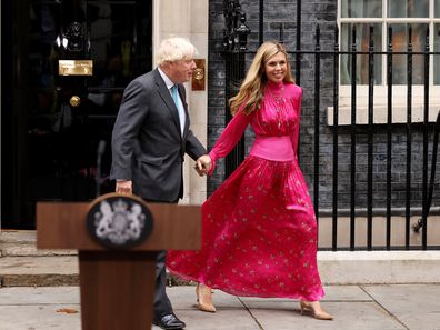 British Prime Minister Boris Johnson arrives with his wife Carrie Johnson as he prepares to deliver a farewell address before his official resignation at Downing Street on September 6, 2022 in London, England. (Photo by Dan Kitwood/Getty Images)